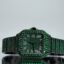 Black Cartier Santos iced Out mit grünen Lab Saphiren
