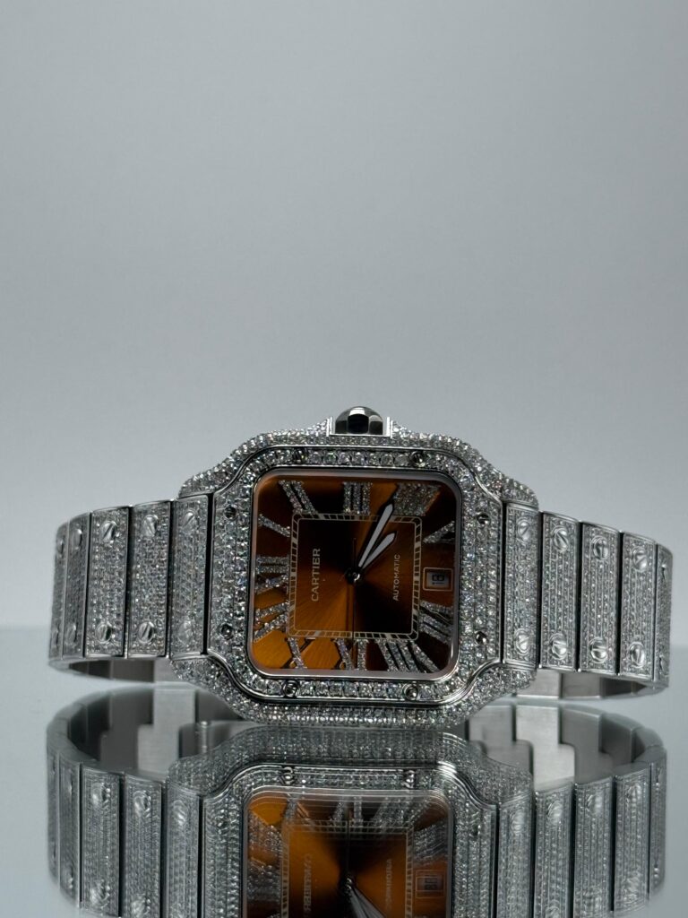 Cartier Santos iced Out mit orangenem Zifferblatt